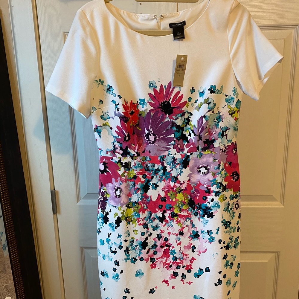 White fitted dress with floral detail